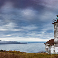 Buy canvas prints of Panorama of a Canadian wooden lightouse in Cape Br by George Cairns