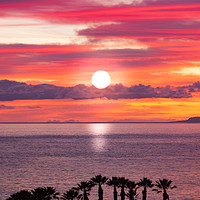 Buy canvas prints of Sunset and silhouettes of the coast of Tenerife by George Cairns