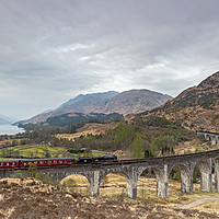 Buy canvas prints of The Majestic Jacobite Train Crossing the Iconic Gl by John Carson