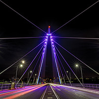 Buy canvas prints of Illuminating the Northern Spire by John Carson