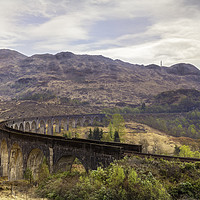 Buy canvas prints of Majestic Glenfinnan Viaduct in the Scottish Highla by John Carson