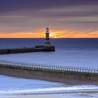 Buy canvas prints of Embracing Sunrise at Roker Pier by John Carson