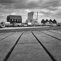 Buy canvas prints of Whitstable Fishing Huts (black and white) by Wayne Lytton