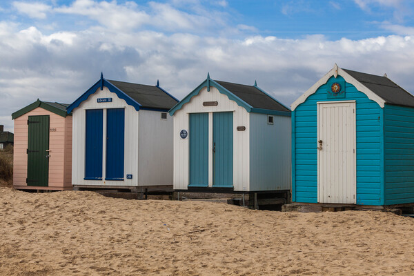 A Colourful Array of Beach Huts Picture Board by Kevin Snelling