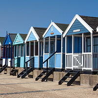 Buy canvas prints of Colourful Beach Huts on Southwold Beach by Kevin Snelling