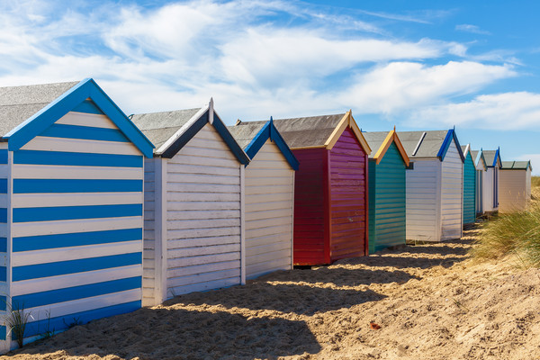 Bright and Vibrant Seaside Cabins Picture Board by Kevin Snelling