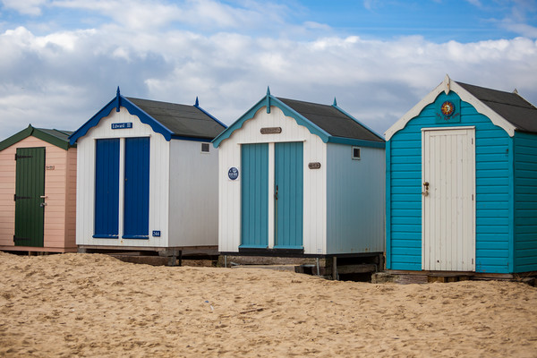 Colourful Seaside Shelters Picture Board by Kevin Snelling