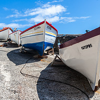 Buy canvas prints of Colourful Fleet of Fishing Boats by Kevin Snelling