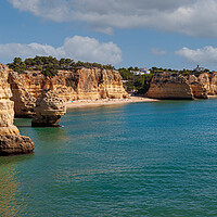 Buy canvas prints of Stunning Marinha Beach Cliffs by Kevin Snelling
