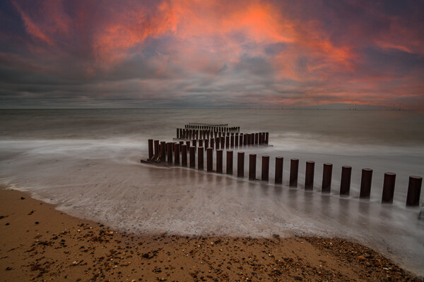 Serene Sunset over Caister Beach Picture Board by Kevin Snelling