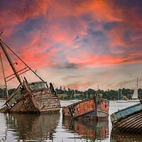 Buy canvas prints of Nostalgic Sunset on Abandoned Boats by Kevin Snelling