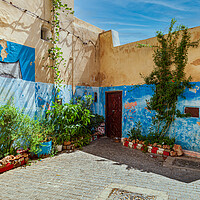 Buy canvas prints of Vibrant Blue Moroccan Medina by Kevin Snelling