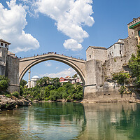 Buy canvas prints of Majestic Arch of Mostar by Kevin Snelling