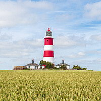 Buy canvas prints of Majestic Happisburgh Lighthouse by Kevin Snelling