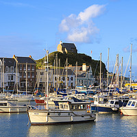 Buy canvas prints of Ilfracombe harbour and St Nicholas Chapel in Devon by Chris Harris