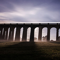 Buy canvas prints of Balcombe Viaduct in the Misty Moonlight at Night by Will Elliott