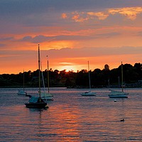 Buy canvas prints of Sunset Over Water by James Allen