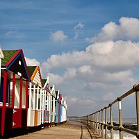 Buy canvas prints of Multi Coloured Beach Huts SouthWold Suffolk by James Allen