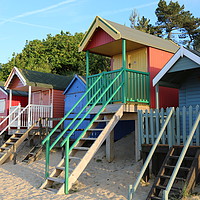 Buy canvas prints of Beach Huts at Wells-Next-The-Sea, Norfolk by Judy Newstead-Howard
