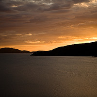 Buy canvas prints of Orange sunset at Loch A Chairn Bhain by Tom Dolezal