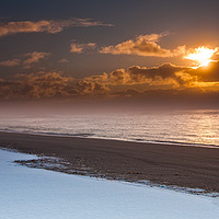Buy canvas prints of Snowy Icelandic winter beach by Tom Dolezal