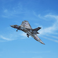 Buy canvas prints of Vulcan Bomber XH558 on final approach by Tom Dolezal