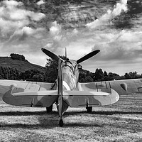 Buy canvas prints of Spitfire under a Kent sky by Tom Dolezal