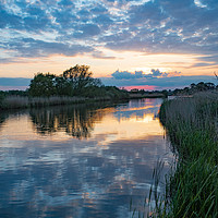 Buy canvas prints of Norfolk sunset reflections by Tom Dolezal