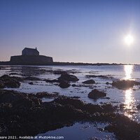 Buy canvas prints of Cwyfan sunset. The chapel in the sea, off Anglesey, Wales. by Jeanette Teare