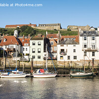 Buy canvas prints of Whitby harbour cottages by Jeanette Teare