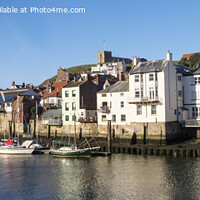 Buy canvas prints of Whitby harbour cottages by Jeanette Teare