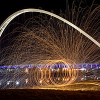 Buy canvas prints of Fire Spinning At The Infinity Bridge by Paul Welsh