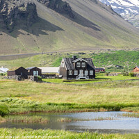 Buy canvas prints of Black Wooden House at Arnarstapi Iceland by JUDI LION