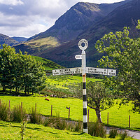 Buy canvas prints of Buttermere road sign in english lake district by Steve Heap