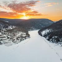 Buy canvas prints of Aerial sunrise over frozen Cheat Lake Morgantown, WV by Steve Heap