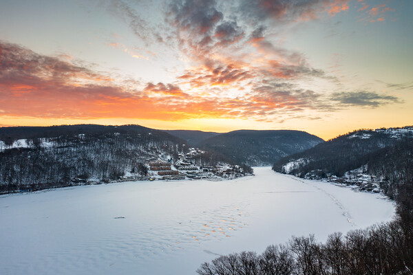 Aerial sunrise over frozen Cheat Lake Morgantown, WV Picture Board by Steve Heap