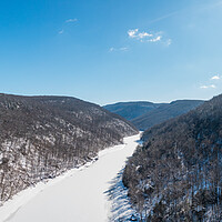Buy canvas prints of Aerial view up the frozen Cheat River in Morgantown, WV by Steve Heap