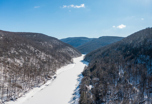 Aerial view up the frozen Cheat River in Morgantown, WV Picture Board by Steve Heap