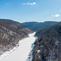 Buy canvas prints of Aerial view up the frozen Cheat River in Morgantown, WV by Steve Heap