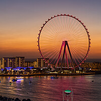 Buy canvas prints of Light show on Ain Dubai observation wheel at sunse by Steve Heap