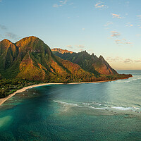 Buy canvas prints of Aerial drone shot of Tunnels Beach at sunrise on Kauai in Hawaii by Steve Heap