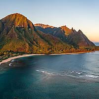 Buy canvas prints of Aerial drone shot of Tunnels Beach at sunrise on Kauai in Hawaii by Steve Heap