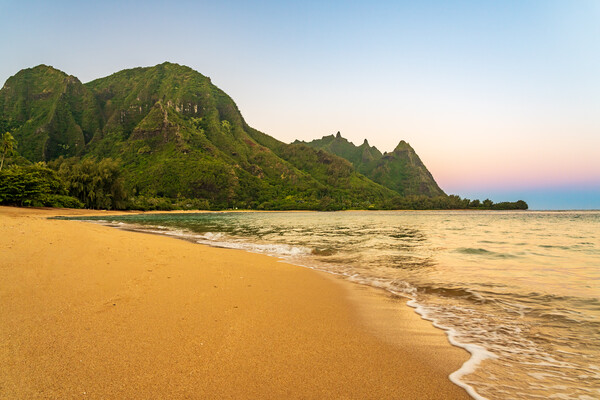 Early morning sunrise over Tunnels Beach on Kauai in Hawaii Picture Board by Steve Heap