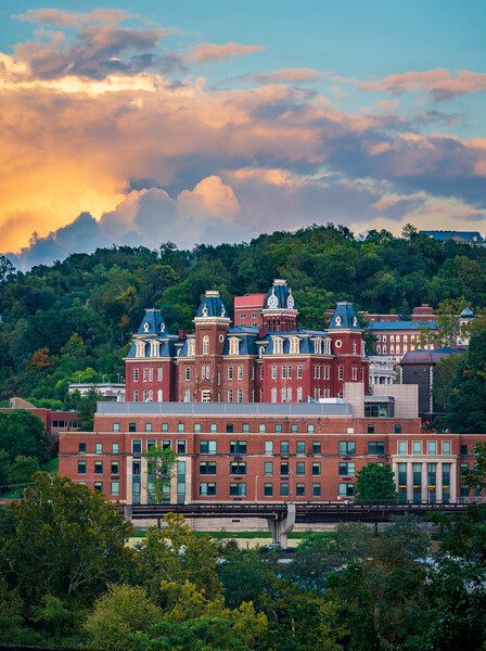 Brooks Hall and Woodburn Hall at sunset in Morgantown WV Picture Board by Steve Heap