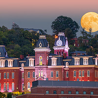 Buy canvas prints of Moonrise over illuminated Woodburn Hall at WVU Morgantown by Steve Heap