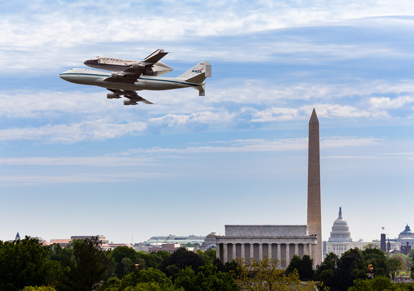 Space Shuttle Discovery flies over Washington DC Picture Board by Steve Heap