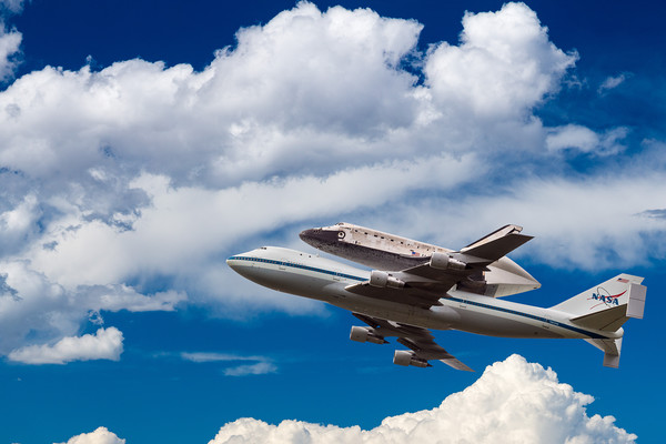 Space Shuttle Discovery flies into clouds Picture Board by Steve Heap