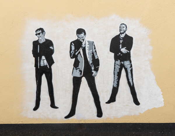 Wall painting of the pop group Muse  Picture Board by Steve Heap