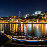 Buy canvas prints of Rabelo boats of Porto in Portugal at night by Steve Heap