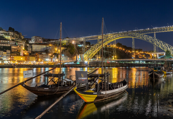 Rabelo boats of Porto in Portugal with bridge Picture Board by Steve Heap
